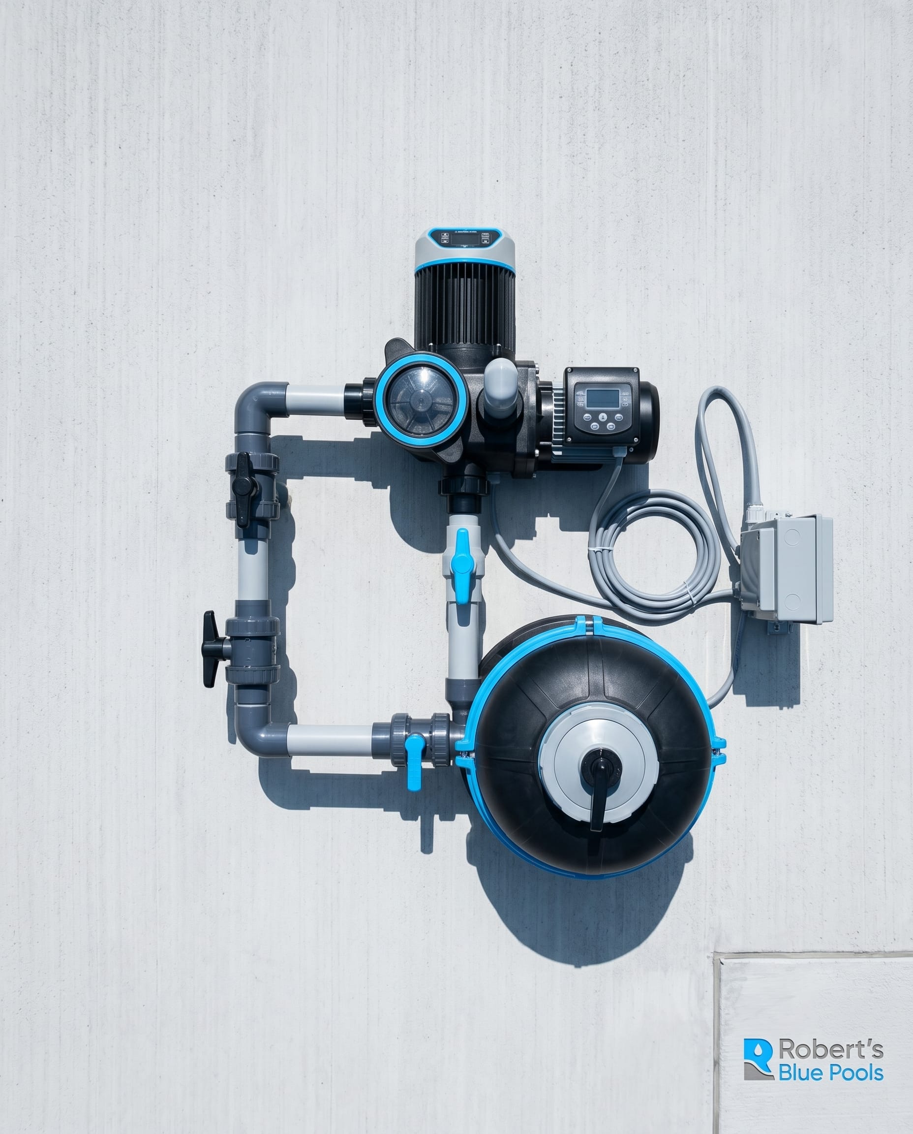 Overhead view of a variable-speed pool pump and cartridge filter on a Miami equipment pad