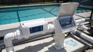 Salt chlorine generator and pool equipment in Miami backyard pool