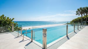 Oceanfront Bal Harbour pool overlooking the Atlantic Ocean in Miami